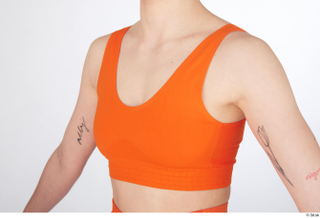 Unaisa chest dressed orange sports bra sports 0002.jpg